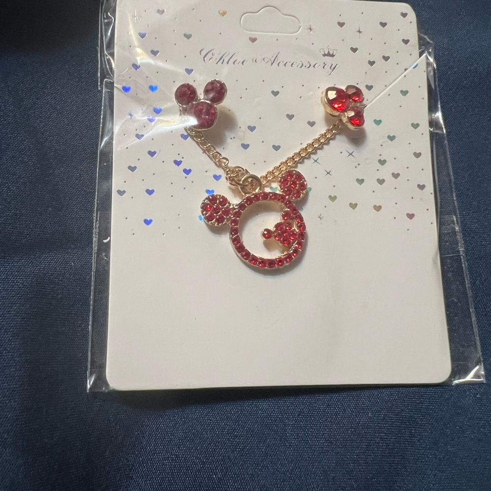 Three Mickey Mouse necklace and earring sets
